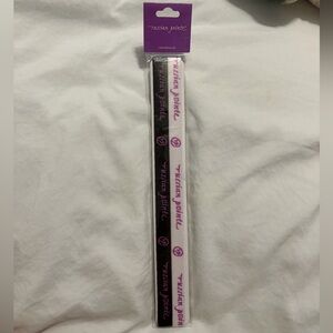 Russian Pointe black and white headbands with purple accents.